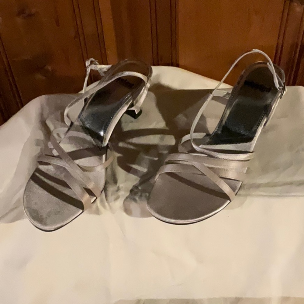 Unlisted by Kenneth Cole, silver gold color, size 9, 1.5 in heel, never worn